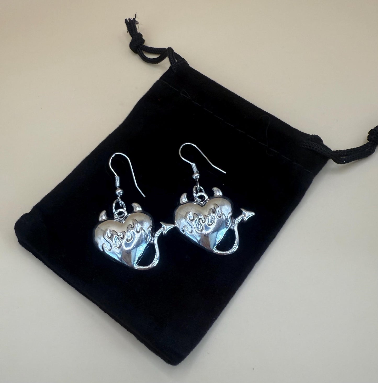 Silver heart & devil tail alloy earrings