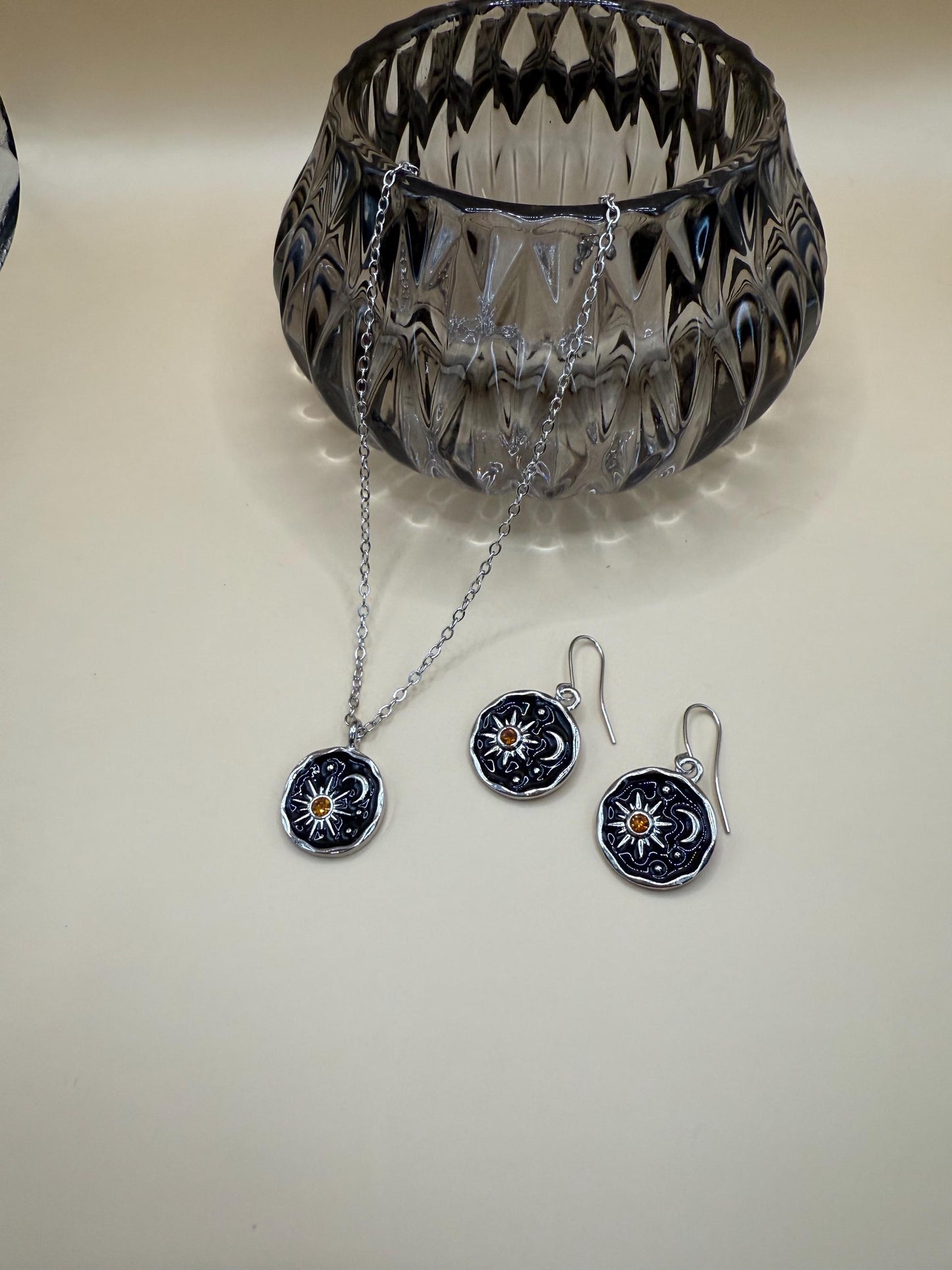 Celestial Sun & Moon jewellery set, earrings and pendant necklace.