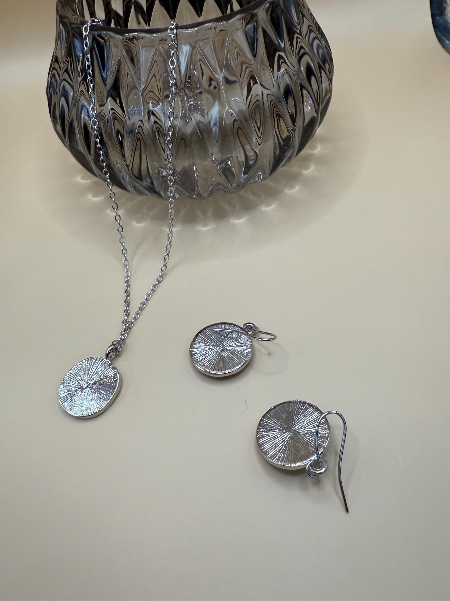 Celestial Sun & Moon jewellery set, earrings and pendant necklace.