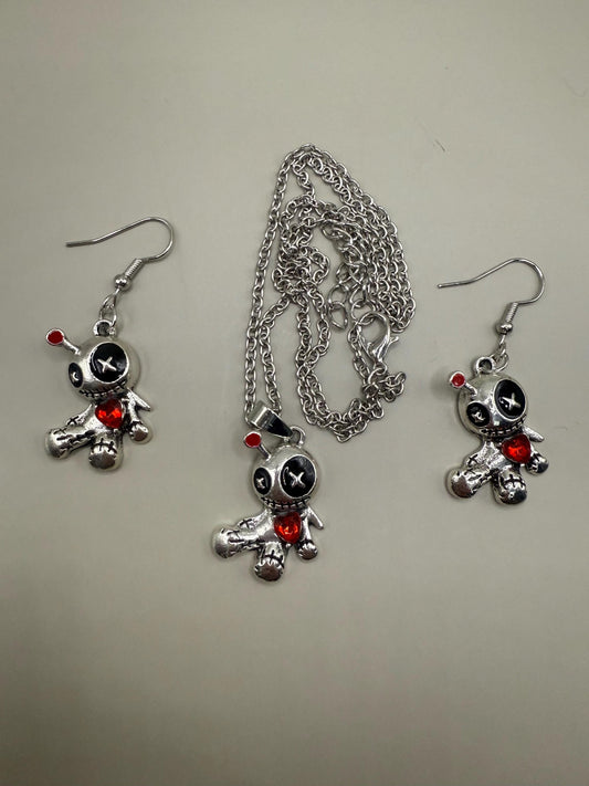 Cute voodoo doll jewellery set, earrings and pendant necklace.