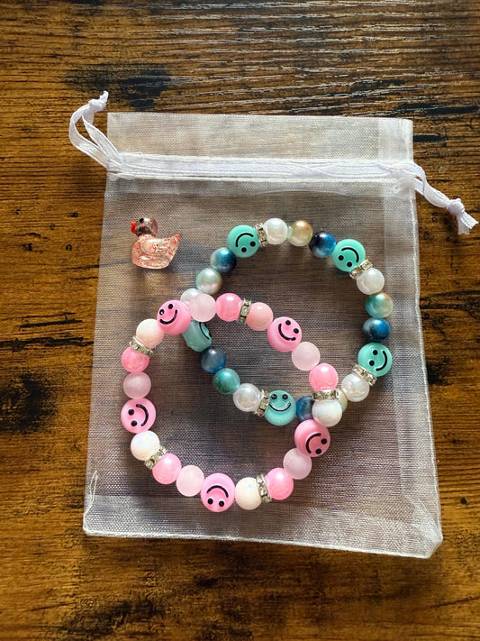 2 x handmade elasticated smiley bead bracelets.